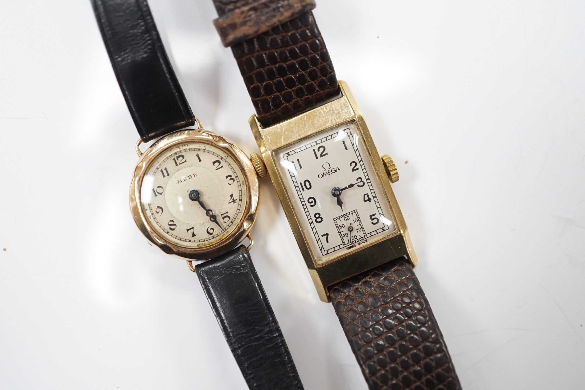 A lady's 1930's 9ct gold Omega manual wind wrist watch, on a later leather strap and a lady's 9ct gold Bebe wrist watch.